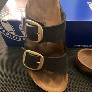 Birkenstock sandals with giant gold buckles size 40. Slightly worn.
